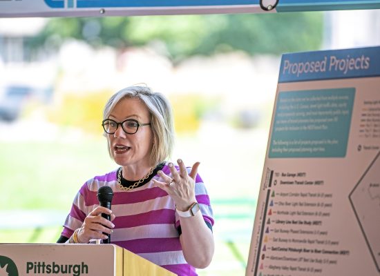 Katharine Kelleman, CEO of Port Authority of Allegheny County, speaks during an open house in Schenley Plaza, Tuesday, July 27, 2021, in Oakland. (Alexandra Wimley/Post-Gazette)